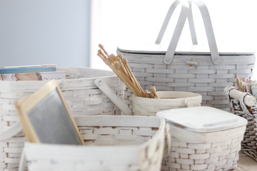 A picture showing a collection of baskets showing how to cheer-up your home with painted baskets