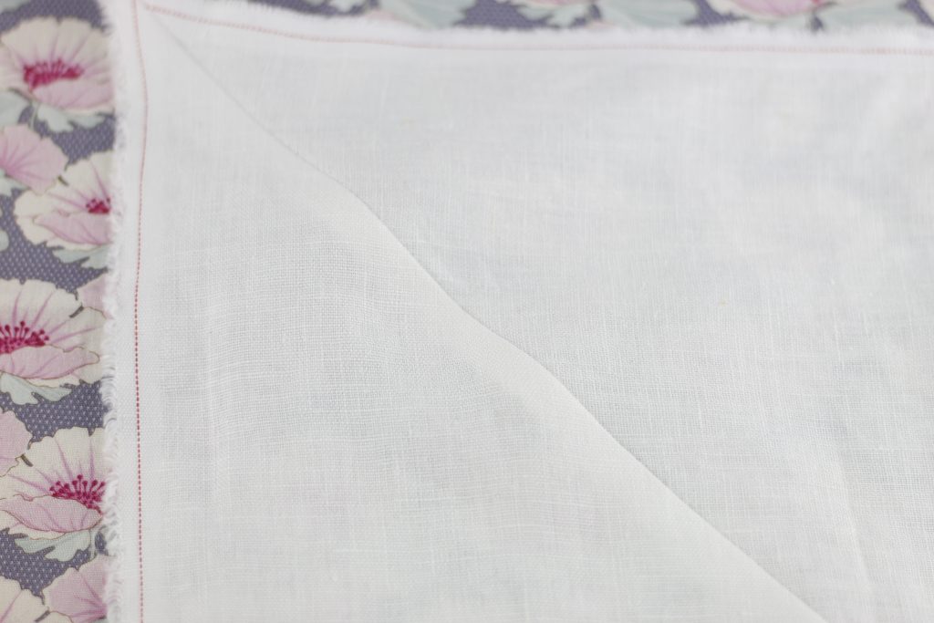 picture of white fabric sewn together