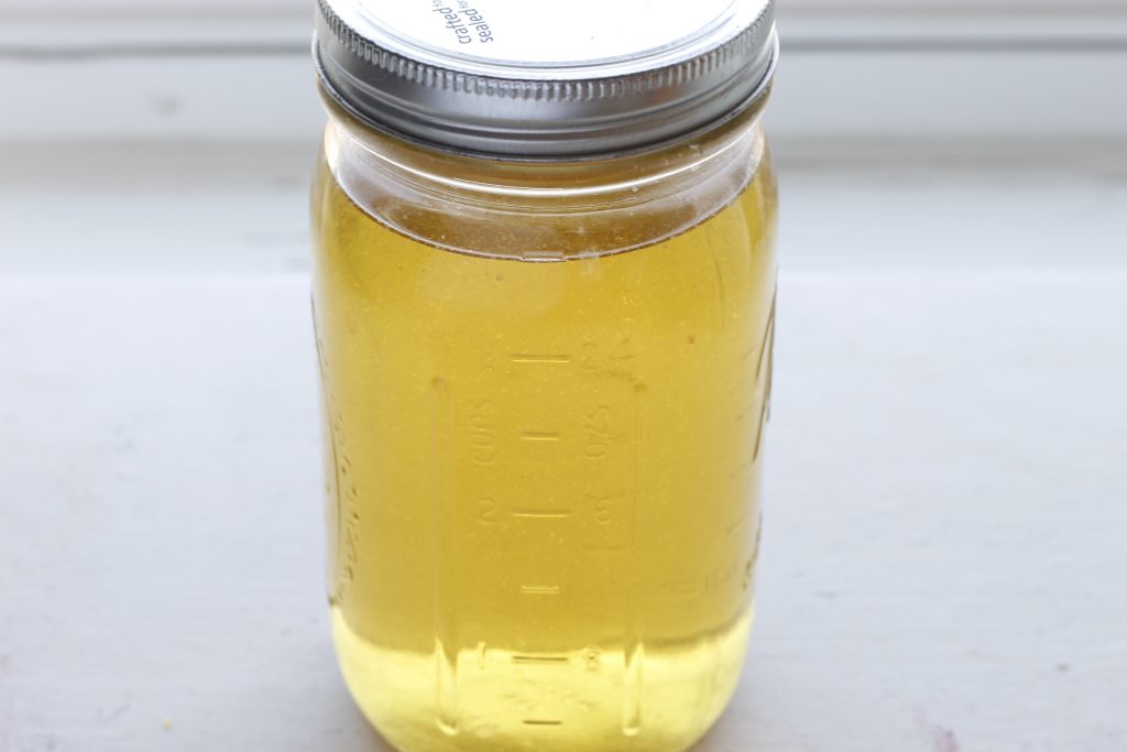 image of a jar of orange-rosemary cleaner