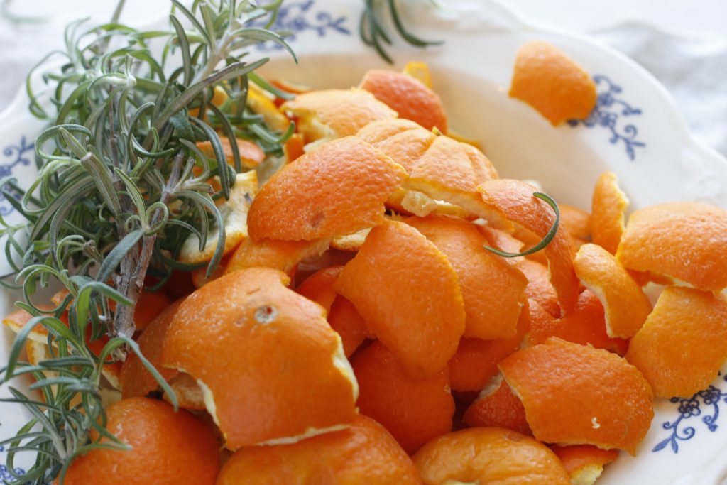 image of orange peels and rosemary in a bowl