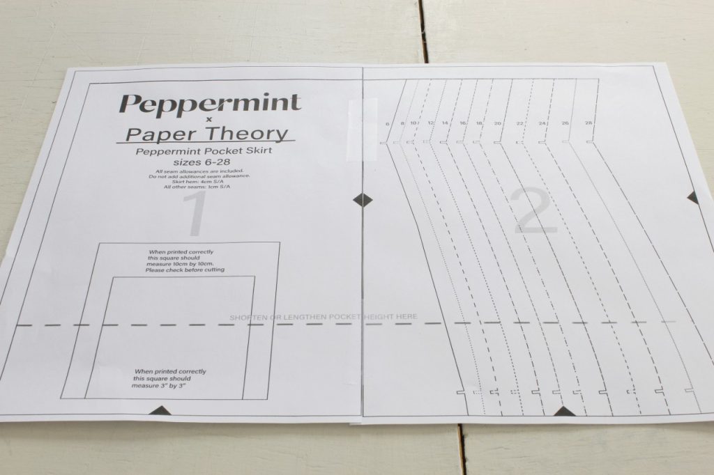 This is an image of pages 1 and 2 of the PDF sewing pattern taped together.