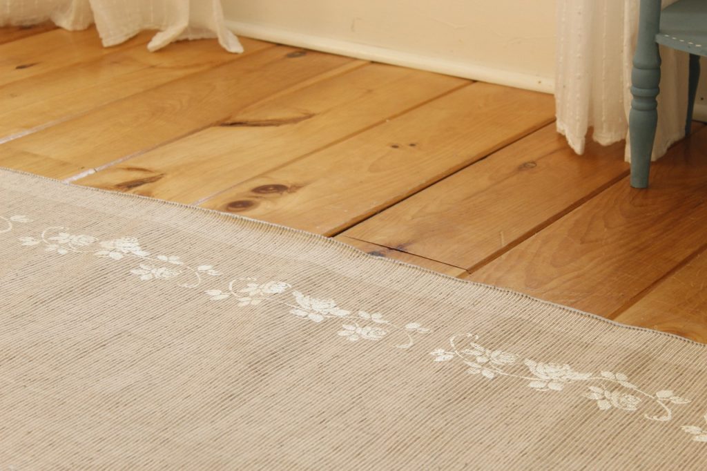 This image shows the rug finished and it is a view from across the room.