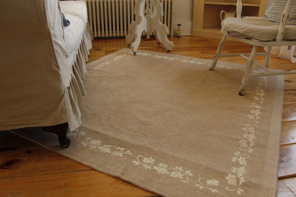 This is an image of the rug, finished and the furniture has been placed onto the rug.