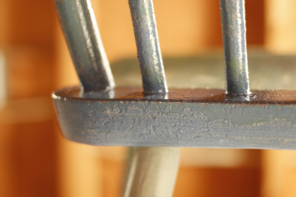 This image shows a portion of my chair with a first coat of Ink Blue paint applied, showing the fact that it sometimes looks worse before it looks better.