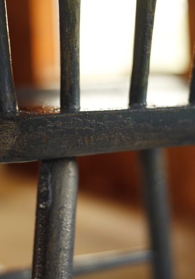 This image shows the chair after the second coat of paint.