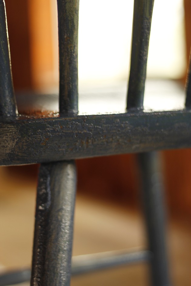 This image shows the chair after the second coat of paint.